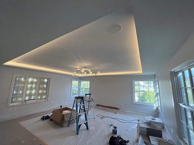 Residential remodel with cove lighting and chandelier by Wheyland Electric - home remodeling